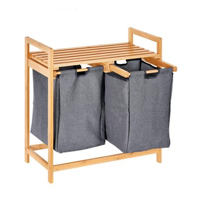 China ZM1029 Minimalist Bathroom Sliding Wooden Laundry Hamper Two-piece Removable Hamper Shelf Bamboo Basket With Double Compartments for sale