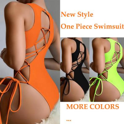 China New Solid Color Antibacterial Sexy One Piece Swimsuit Hollow Out Cross Strap Design Swimwear Bikinis And Beach Wear for sale