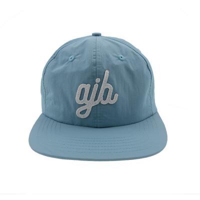 China COMMON Fabric Feature Custom Embroidered Turquoise Nylon 6 Panel Summer Snapback Hat for sale