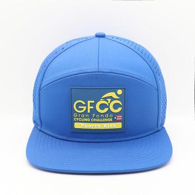 China 7 Panel Laser-Schnitt-Loch Snapback Cap Hut mit Gummi-Patch Wasserdichtes kundenspezifisches Design zu verkaufen