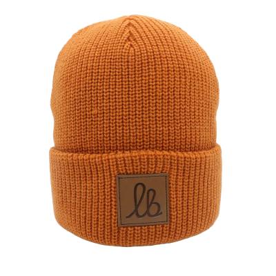 China Leather Patch Beanie Knitted Hat Winter Hats Fisherman Beanie COMMON Fabric Feature for sale