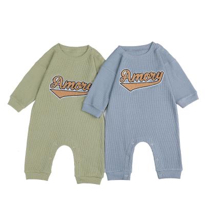 China Comfortable baby clothes autumn and winter new baby onesie cotton waffle baby romper newborn baby wrap for sale