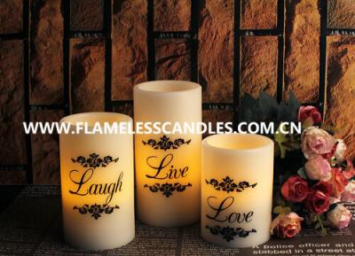 China Velas sin llama redondas del pilar de la decoración casera LED con la impresión real de la cera y del negro en venta