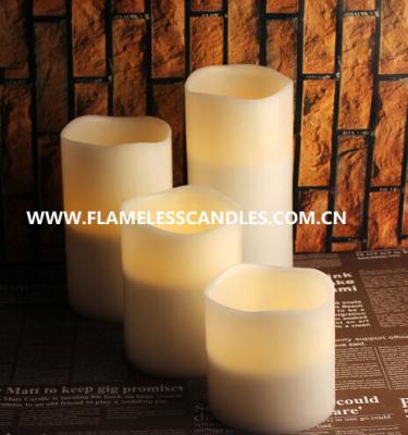 China Paraffin Wax Round White Flameless LED Pillar Candles With Wax In Ivory With Wavy Edge for sale