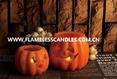 China Battery Operated Halloween LED Candles , Wax Carved Pumpkin Flameless Candles with Glitter for sale