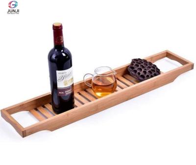 China JUNJI Multifunctional Viable Wooden Bathroom Bathtub Tray Bathtub Tray Wine Bottle Glass Rack for sale