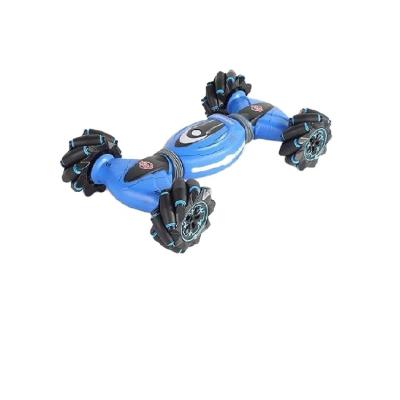 China Remote Control Rc Stunt Car Remote Control Gesture Feeling Twisting Vehicle Drift Dumper Car Toys Drive Toys Gifts for sale