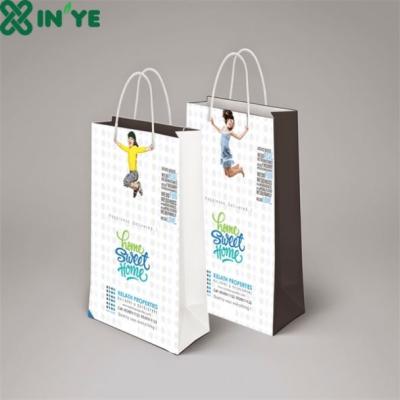 China Disposable Eco-Frinedly Disposable Twist /Flat Handle Take Out Bag With Logo Printed for sale