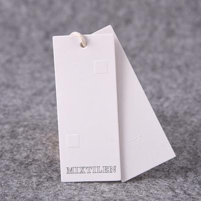 China Heat Sensitive Recycled Garment Labels Embossed Custom Printing Clothes Hangtags for sale