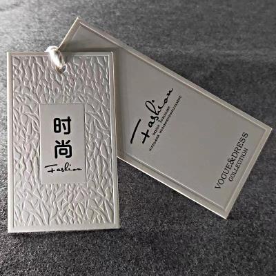 China Heat Sensitive Biodegradable Custom Printed Personalized Hangtags Embossed Logo Hang Tags Label for sale