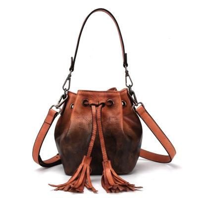 China Custom Vintage Single Strap Water Resistant Fashion Leather Shoulder Bag Women With Tassel for sale