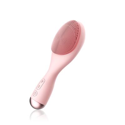 China Ultrasonic Wireless Exfoliating Heating Sonic Silicone Facial Cleansing Brush Electric Acne Treatment Rechargeable Face Exfoliator for sale