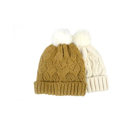 China Beautiful tassel & high quality fashion cable jacquard yarn Icelandic beanie with fur pom pom cable jacquard hat for sale