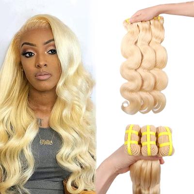 China Curly Curl 40 Inch Hair Weft Bundles Vendor Extensions Blonde 613 Body Wave Virgin Brazilian Hair for sale