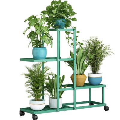 China Outdoor Multi-Layer Balcony Flower Rack Indoor Decoration Viable Easy To Move Flower Pot Rack With Wheels for sale