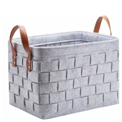 China Viable Wholesale Held Woven Basket Dirty Clothes Toys Storage Basket Sundries Felt Storage Basket for sale