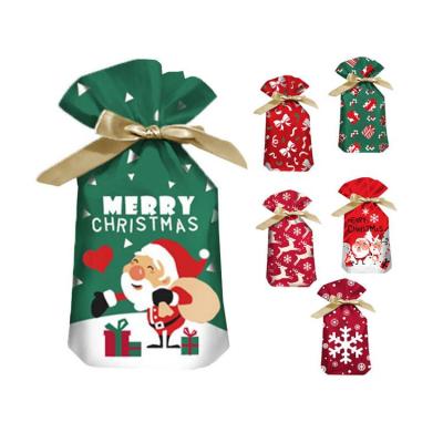 China Plastic Drawstring Bag Stock Gift Bags Christmas Candy Bags Small Christmas Gifts Packing Bag for sale