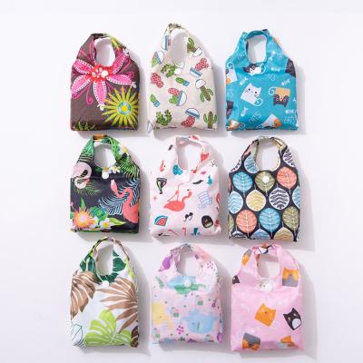 China Korean Printing Mall Foldable Recyclable Shopping Handbags Folding Waterpproof Daily Portable Handbag for sale