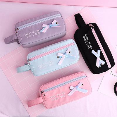 China New Large Capacity Bow Tie Ribbon Pen Bag Cute Love Double Zipper Cute Stationery Bag Stationery Bag For Girls With Handle Hand for sale