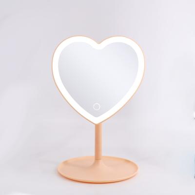 China LED Lighted Adjustable Heart Shaped Light Make Up Mirror Screen Touch Table Dressing Table Mirror With Round Tray for sale