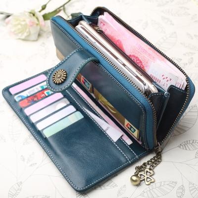 China 2021 Women's Latest Fasion New Retro Long Zipper Wallet Mobile Phone Bag for sale