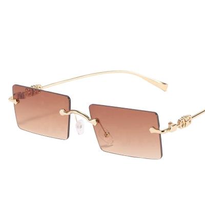 China Fashion sunglasses suitable for men and women high quality lenses small rectangular rimless sunglasses for sale