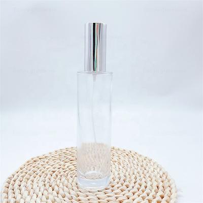 China Essential Oil Skin Care Packaging 100ml Glass Perfume Bottle With Mist Spray for sale