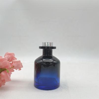 China Reed Custom Acceptable 130ml Gradient Blue Color Glass Diffuser Bottle With Cork Lid for sale