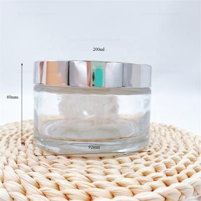 China 200ml facial cosmetic packaging glass cosmetics jars glass cream jars wholesale for sale