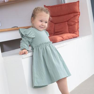 China Anti-wrinkle toddler baby cotton linen dress long sleeve ruffle dress kids autumn dresses clothes for sale