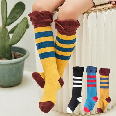 China Custom Antibacterial Cotton Funny Cute Cute Polyester Organic Girl Text Stylist Stripped Knee Long Slouch Socks Girl for sale