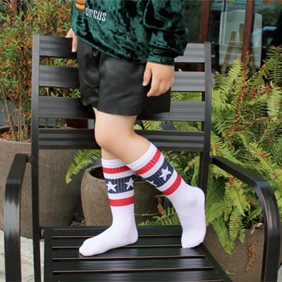 China Autumn spring non-slip children solid color anti-skid cotton new slouch custom print kids sock for boys and girls for sale