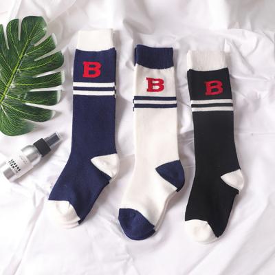 China Solid Color Autumn Spring Non-slip Children New Anti-skid Cotton Slouch Socks Long Socks for Boys and Girls for sale