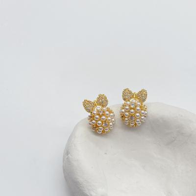 China Fashionable retro bow earrings pearl female high-end sense of the light luxury temperament earrings simple earrings for sale