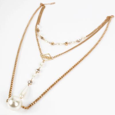 China Fashion Romantic Multilayer Pendant Necklace Alloy Hollow Love Necklace Pearl Drop Female Pearl Drop Pendant for sale