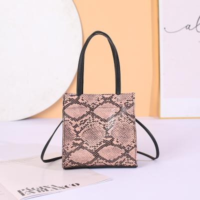 China European and American fashion women's bucket lock contrast pattern snake style bag diagonal shoulder handbag for sale