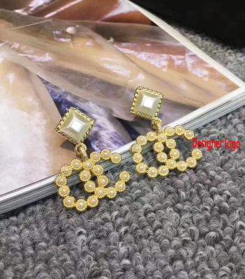 China Custom Famous Brand Initials Designer Earrings Luxury Retro FASHIONABLE Custom Made for sale