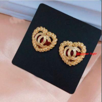 China FASHIONABLE luxury silver plated ladies shape earrings designer brand letter earrings for sale