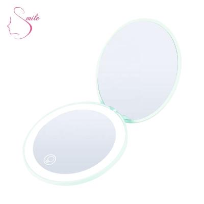 China Amazon Hit Makeup Custom Small Round Vanity Lighted Handheld Cosmetic Poet Mirror With LED Lights for sale