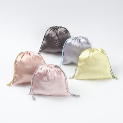 China Luxury Colorful Dust Silk Drawstring Eyelash Hair Bag Jewelry Promotion Customized Drawstring Silk Pouch for sale