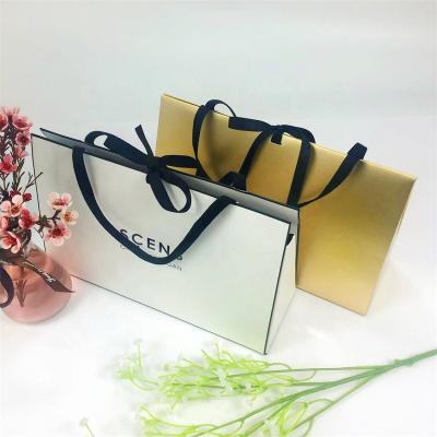 China Wholesale Eco-friendly Distinctive Stylish Shape Paper Advertising Decoration Retail Bag For Gift Packaging for sale