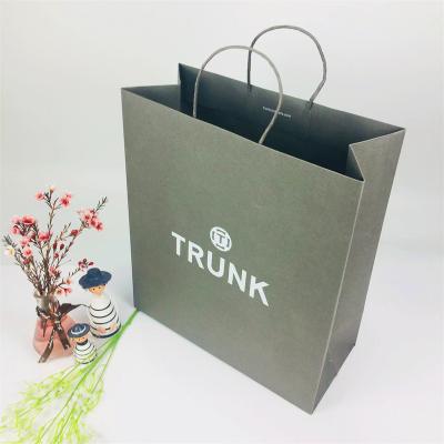 China New China Supplier Eco-friendly Stamp Logo Shopping Kraft Bags Twisted Paper Bag White Cheap Handle For Gift for sale