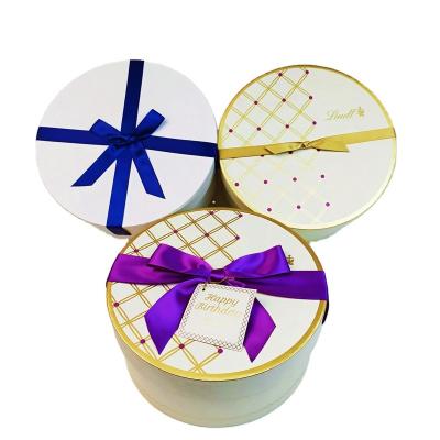 China Recycled Materials Wholesale Fashion Design Round Paper Box Packaging With Bow Gift Ribbon for sale