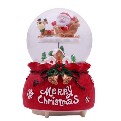 China Worlwide 2022 New Christmas Music Box Ornaments Creative Christmas Tree Old Man Crystal Ball Blessing Bag Gift Lights for sale