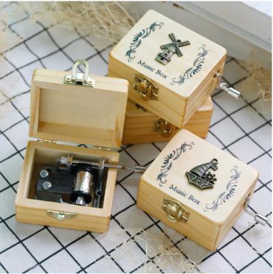 China Metal wood-metal style animal music box operated sky city pelicate metal hand-cranked music box for sale