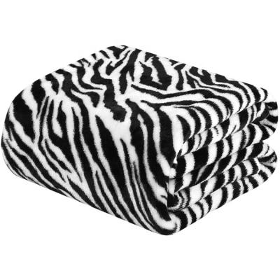 China Custom Design Anti-Static Knitted Throw Zebra Print Flannel Fleece Super Soft Thick Large Printing Blanket for sale