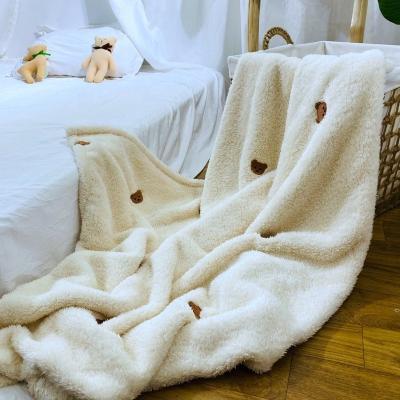 China Comfortable Extra Thick Solid Anti-Pull Cartoon Bear Embroider Fleece Blanket Coral Custom For Kids Blanket for sale