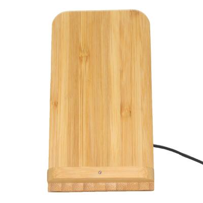 China Fast Wireless Mobile Phone Charger Stand 10W Wooden Coil Desktop Smart Usb Qi Mobile Phone Dual Stand for sale