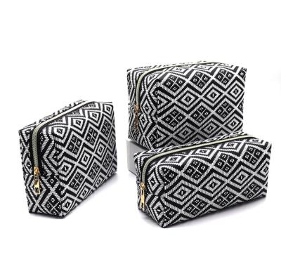 China Durable Luxury Geometric Cosmetic Bags Cosmetic Lip Case Makeup Bag Set Custom for sale