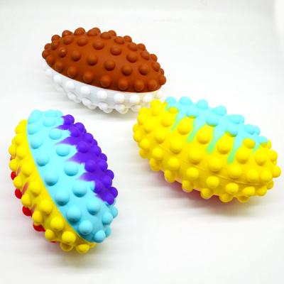 China Push Ball 2022 Push Ball Silicone Snap Relief Wholesale Shipping Stress Puzzle Kid's Maths Concentration Rugby Stress Tosser Balls Oval bubble mental arithmetic fast sensory doll for sale